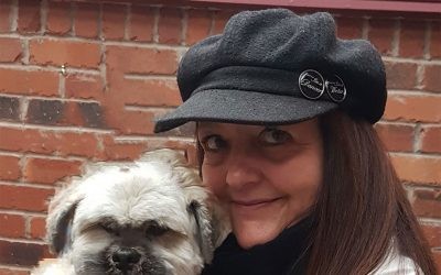 Heather smiling with her dog